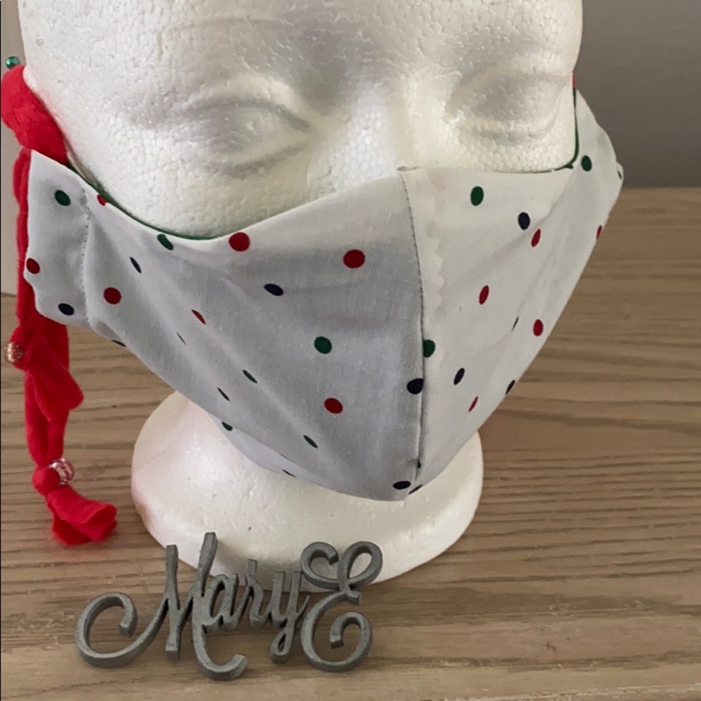 Dot face mask blue red green on white background